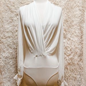 White cross front bodysuite.